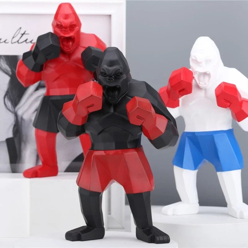 Trois Statues Gorilles Boxers